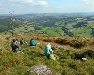 Members of Kington Walks on a hillside